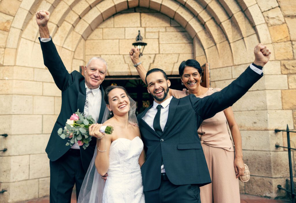 wedding mother and father with a happy couple